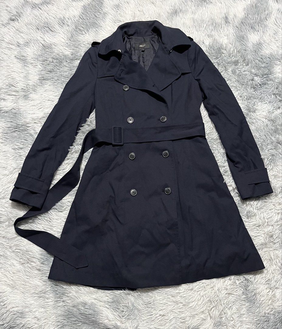 G2000 Double Breasted Trench Coat (Category: Coats, Jackets and Outerwear) located in Sasmuan (Sexmoan). Submitted by winterclothes.ph (Listing ID 1453258268, Image 1). Description: G2000 Double Breasted Trench Coat 32 on tag Women’s Width 16.5 Length 34 Verygood Condition Sign of usage re stitch check pick.