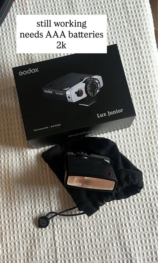 Godox Lux Junior Retro Camera Flash (Category: Cameras) located in Quezon City. Submitted by makeupmatcha (Listing ID 1453288459, Image 1). Description: - Godox Lux Junior retro camera flash - Still working well - Requires AAA batteries - Selling price: PHP 2,000 - Includes protective pouch - Perfect for achieving a vintage aesthetic in your photos.