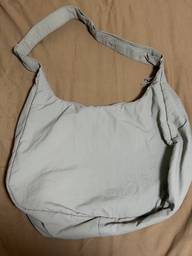 GU Soft Nylon Round Shoulder Bag (Taupe) (Category: Cross-body Bags) located in Mandaluyong City. Submitted by _jdeclutters (Listing ID 1453317719, Image 2). Description: .