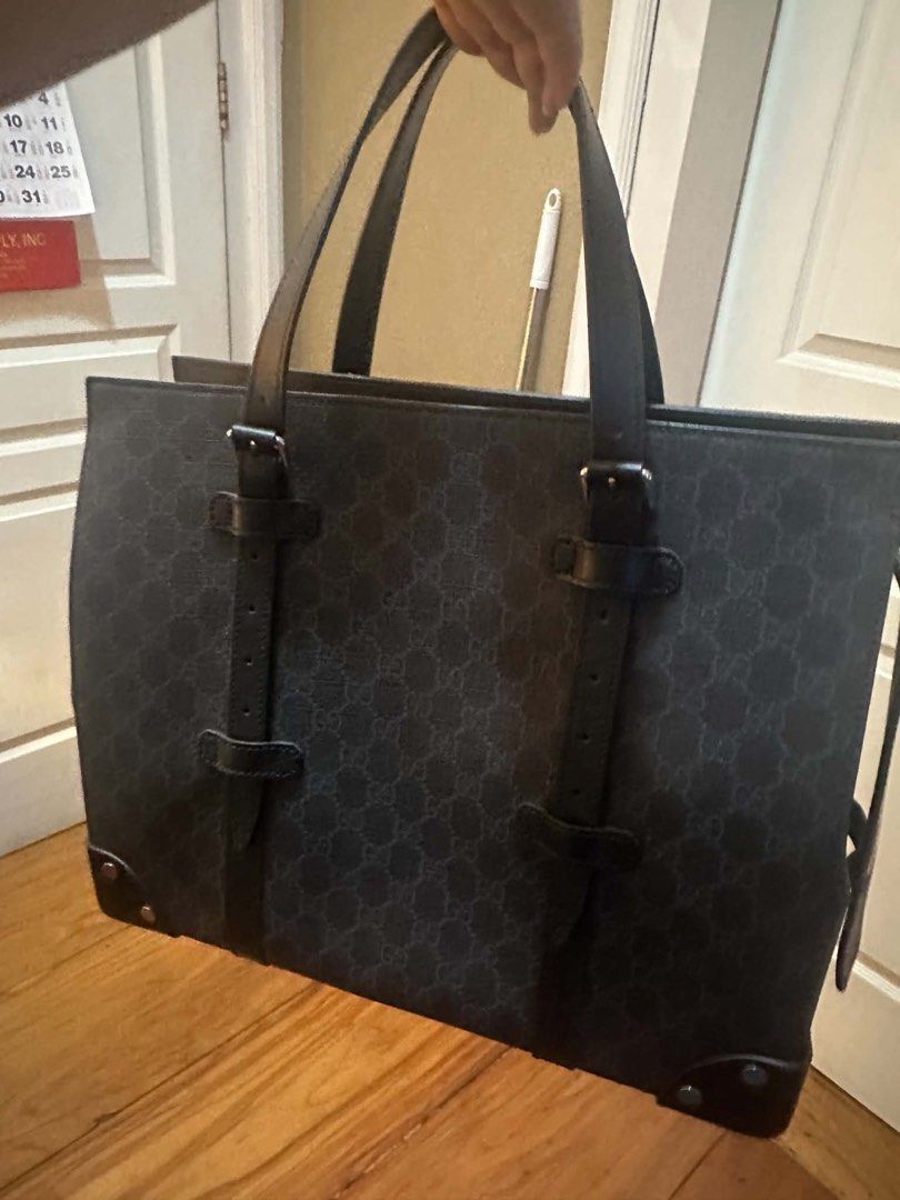 Gucci GG Supreme Briefcase (Category: Luxury Bags & Wallets) located in Quezon City. Submitted by i.i.mnl (Listing ID 1453277458, Image 1). Description: Authentic Gucci GG Supreme Briefcase / Tote Bag (Black/Grey) 💼 Price: ₱70,000 (Negotiable) Condition: Very Good! Carefully used and well-maintained. Comes complete with the original Gucci dustbag. Bag Features: Material: Signature black and grey GG Supreme coated canvas—super durable, scratch-re