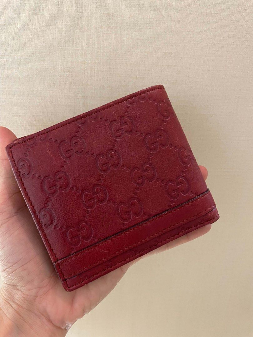 Gucci Monogram Bifold Wallet Red Leather (Category: Luxury Bags & Wallets) located in Manila. Submitted by luxblocc (Listing ID 1453271302, Image 2). Description: - Authentic Gucci bifold wallet - Classic GG monogram on red leather - Multiple card slots inside - Serial number visible in photos - Stylish accessory for everyday use.