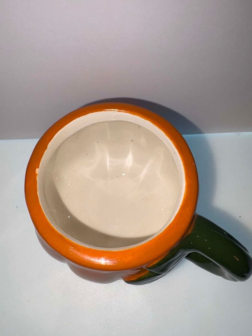 Hobby Lobby Pumpkin Espresso Mug (Category: Coffee & Tea Tableware) located in Caloocan City. Submitted by rabbithole2026 (Listing ID 1453356645, Image 3). Description: Hobby Lobby Pumpkin Espresso Mug Dimensions: 2.38" H x 4" W x 3.06" D Volume: 5 Ounces Material: Ceramic Color: Orange & Green Care & Safety: Food & Dishwasher Safe; Do Not Microwave.