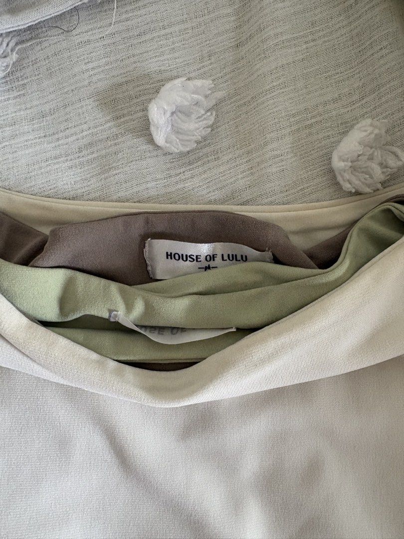 House of Lulu Bundle (Category: Sleeveless) located in Quezon City. Submitted by heyitsbianca (Listing ID 1453287705, Image 2). Description: House of Lulu Crop tops. Size M-L (White Green, Gray) Message me for more pics. RFS: Decluttering.