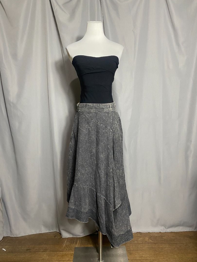 Initial Acid-Wash Asymmetrical Denim Skirt (Category: Skirts) located in Las Pinas. Submitted by ipickyou (Listing ID 1453298420, Image 2). Description: Unwashed Condition: 10/10 𝗣𝗿𝗶𝗰𝗲: ₱𝟴𝟴𝟬 𝗠𝗲𝗮𝘀𝘂𝗿𝗲𝗺𝗲𝗻𝘁𝘀 𝘄𝗵𝗲𝗻 𝗹𝗮𝗶𝗱 𝗳𝗹𝗮𝘁: -Waist: 13 1/2-16” -Length: H 27”, L 36”.