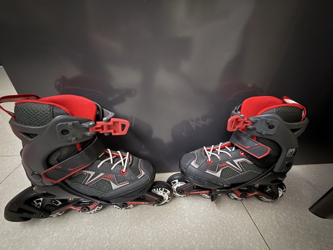 Inline Skates (Category: Skates, Rollerblades & Scooters) located in Singapore. Submitted by mhy1979 (Listing ID 1453250660, Image 2). Description: Inline skates for kids Black and red color scheme Suitable for recreational activity Adjustable size EU 29-32 .