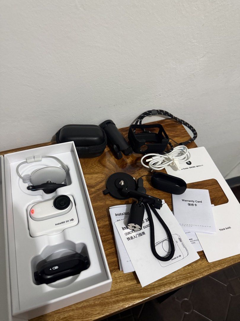 Insta360 GO 3S (128GB) – Complete Set (Category: Cameras) located in Binan City. Submitted by azriiila (Listing ID 1453350181, Image 1). Description: 📦 In the Box: * Insta360 GO 3S with Action Pod * Charging Cable * Lens Guard * Magnet Pendant * Easy Clip * Pivot Stand (cracked but still usable) * Warranty Card * Quick Start Guide 🎁 Freebies / Extras: * Pouch * Silicone Cover for Insta360 GO 3S * Silicone Cover for Action Pod * Protective Case 