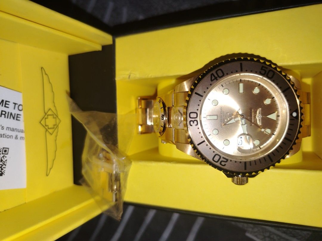 Invicta Pro Diver Gold Tone Automatic Watch (Category: Men's Watches) located in Naic. Submitted by dionidomar17408 (Listing ID 1453281470, Image 1). Description: - Gold tone Invicta Pro Diver watch - Automatic movement - Comes with original box and manual - Ideal for everyday or special occasions - Feel free to ask any questions!.