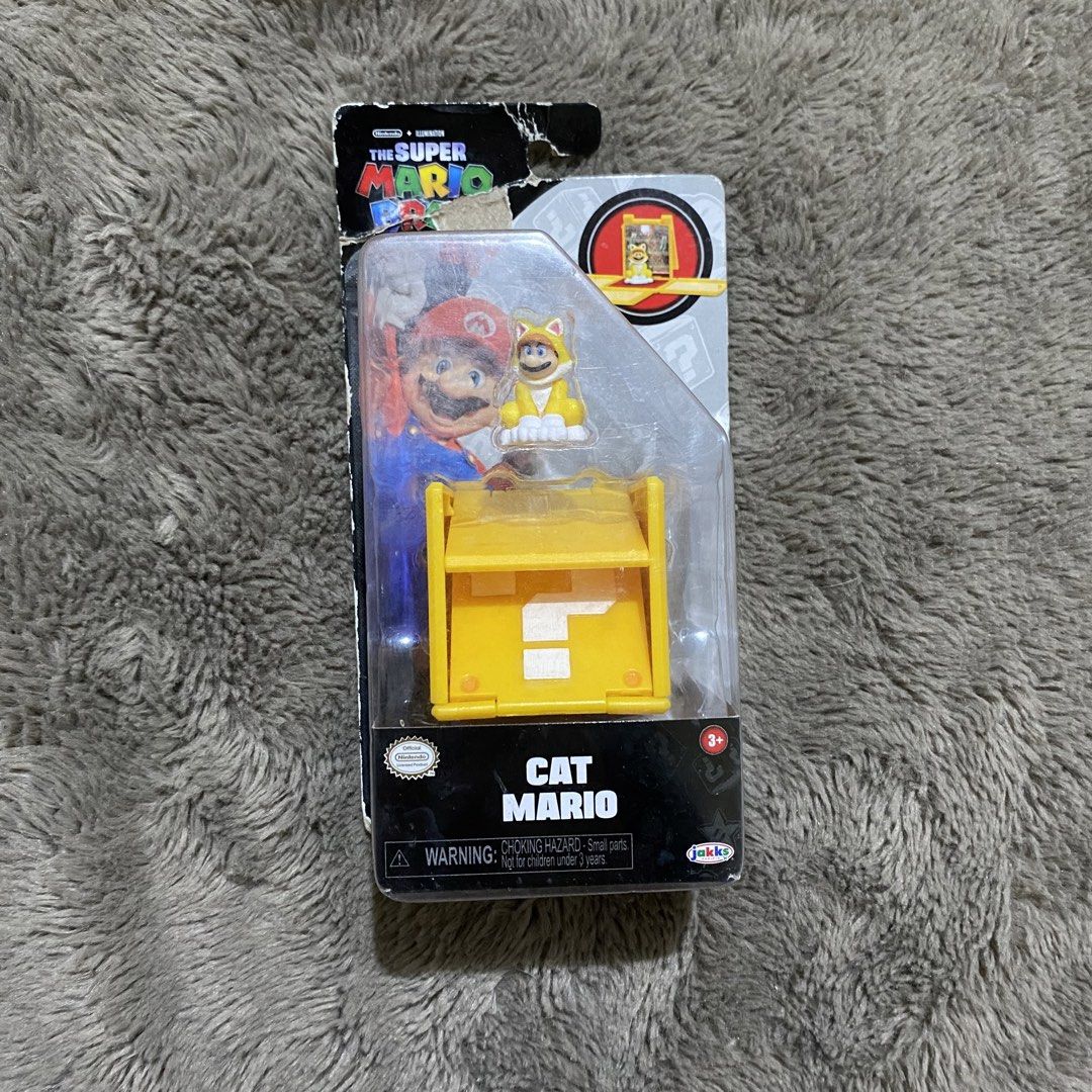 Jakks Pacific Cat Mario Miniature Figure (Category: Figurines & Statues) located in Manila. Submitted by cloudestine (Listing ID 1453410079, Image 2). Description: Brand new but damaged packaging.