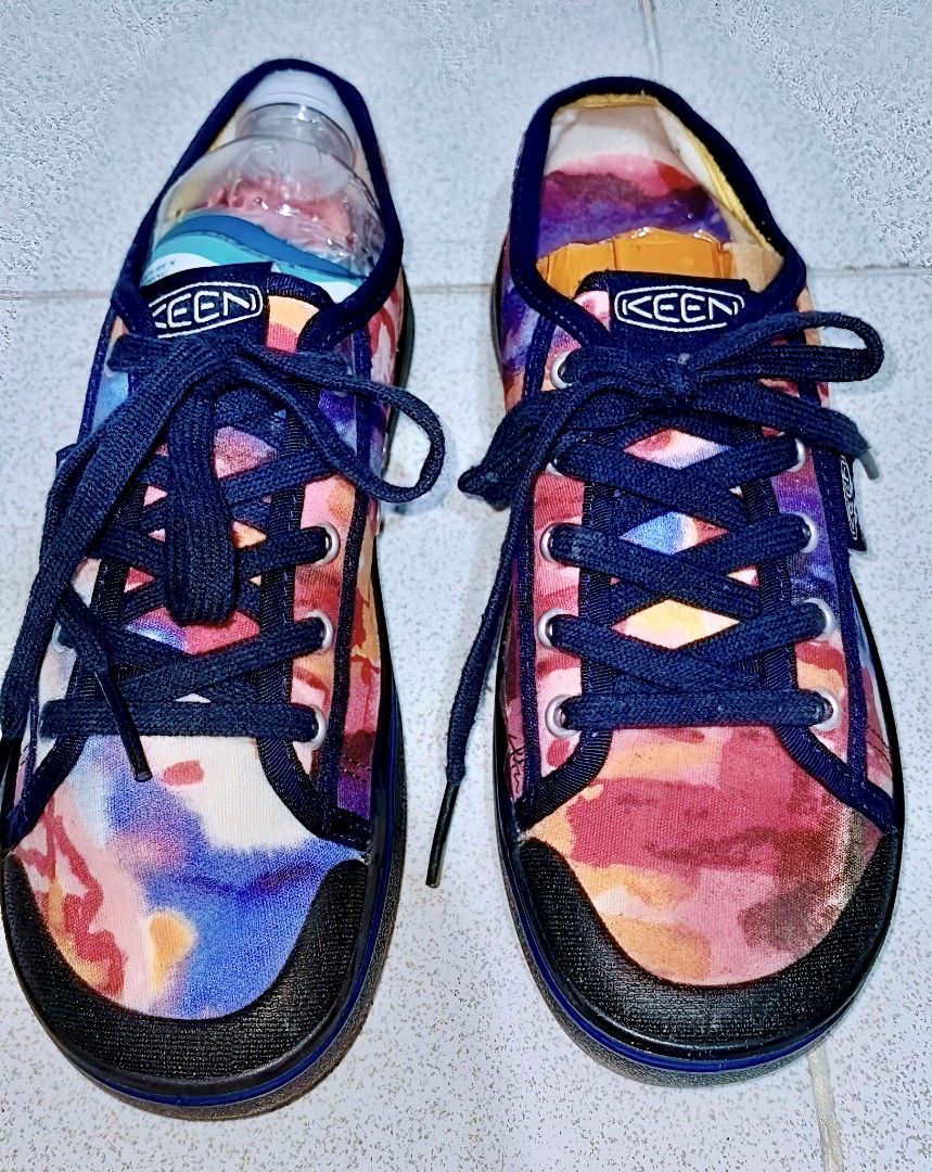 KEEN Garcia Collaboration Canvas Sneakers (Category: Sneakers) located in Manila. Submitted by gensenspar70846 (Listing ID 1453419996, Image 3). Description: - Eye-catching KEEN sneakers with a vibrant abstract print. - Features navy blue laces and trim for a stylish contrast. - Garcia collaboration details visible on the tongue and heel. - Low-top canvas construction for comfort and flexibility. - Durable rubber toe cap and sole for everyday wea