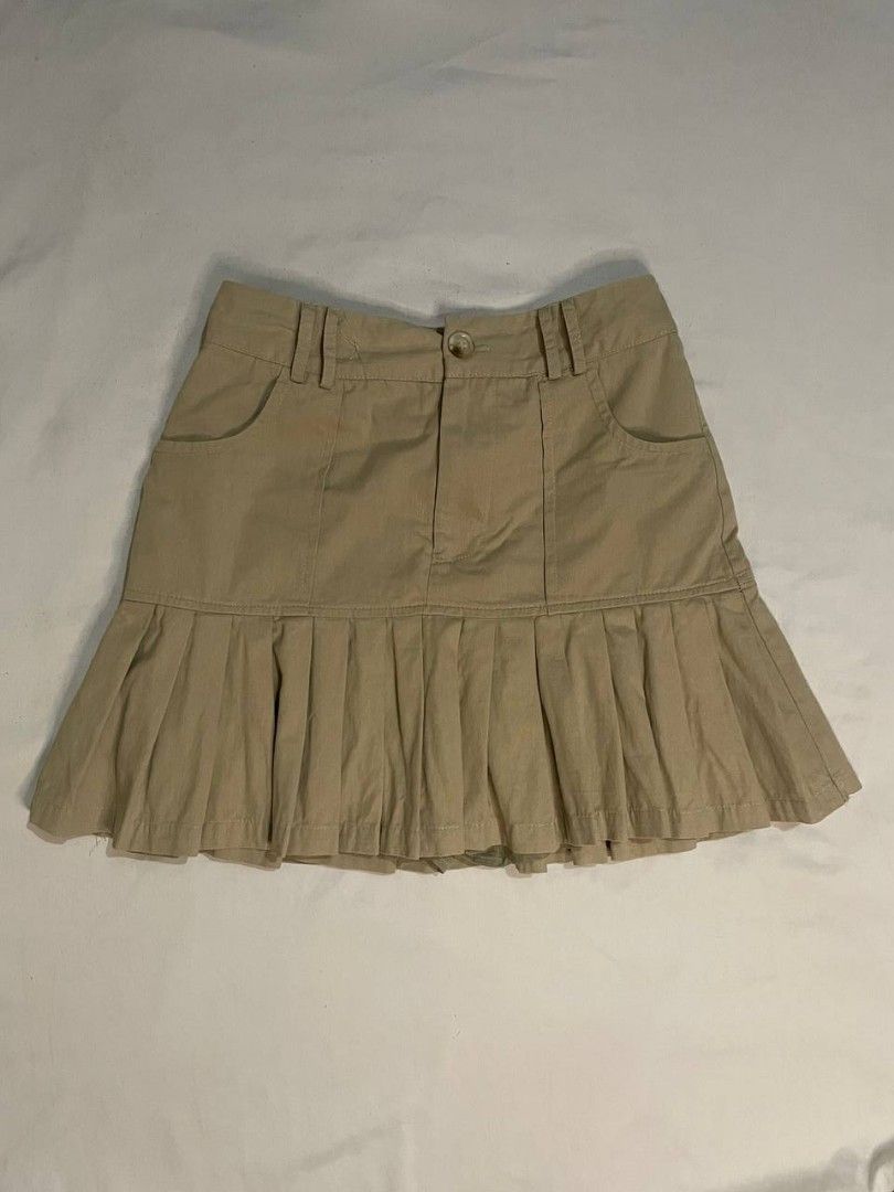Khaki Denim Pleated Mini Skirt (Category: Skirts) located in Binan City. Submitted by declutterbyjwy (Listing ID 1453407413, Image 1). Description: waist: 24-25 | length: 14" - with inner short - soft denim fabric - good as new, never used - no flaws.