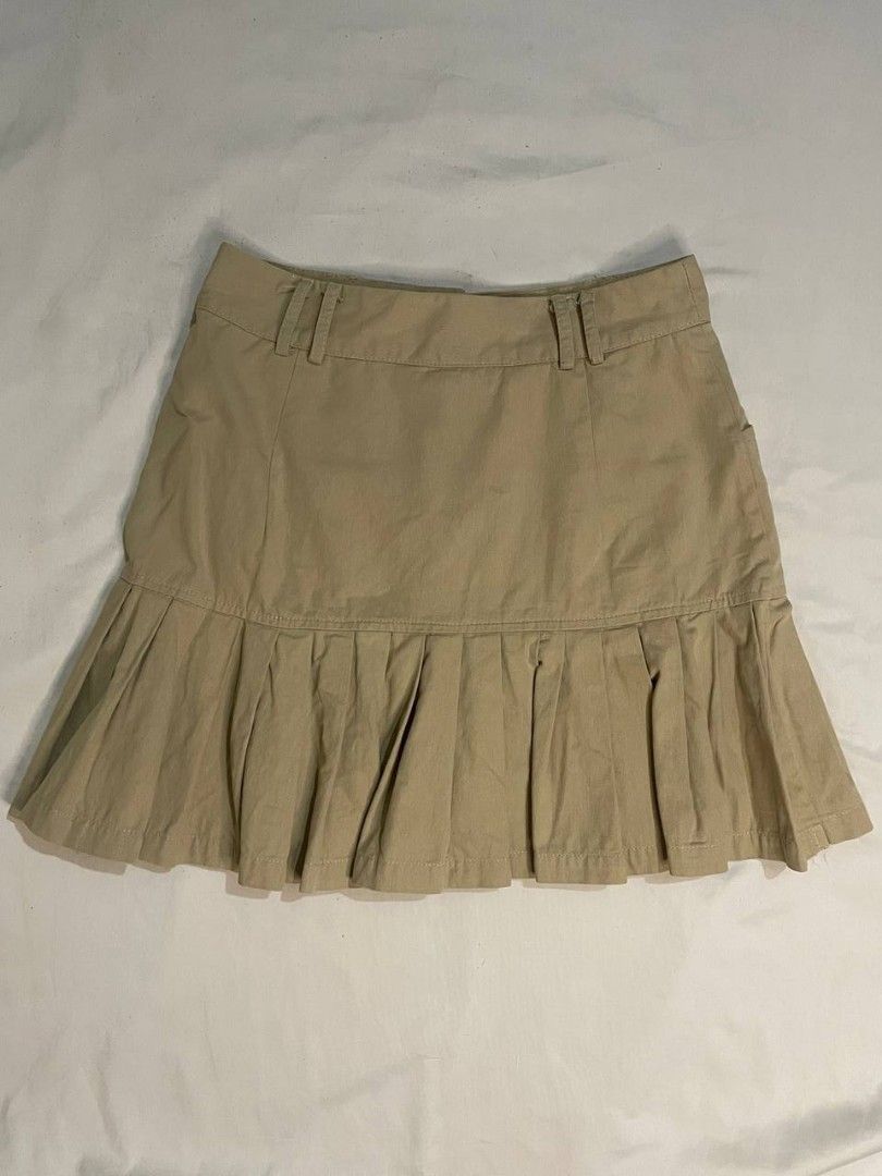 Khaki Denim Pleated Mini Skirt (Category: Skirts) located in Binan City. Submitted by declutterbyjwy (Listing ID 1453407413, Image 2). Description: waist: 24-25 | length: 14" - with inner short - soft denim fabric - good as new, never used - no flaws.