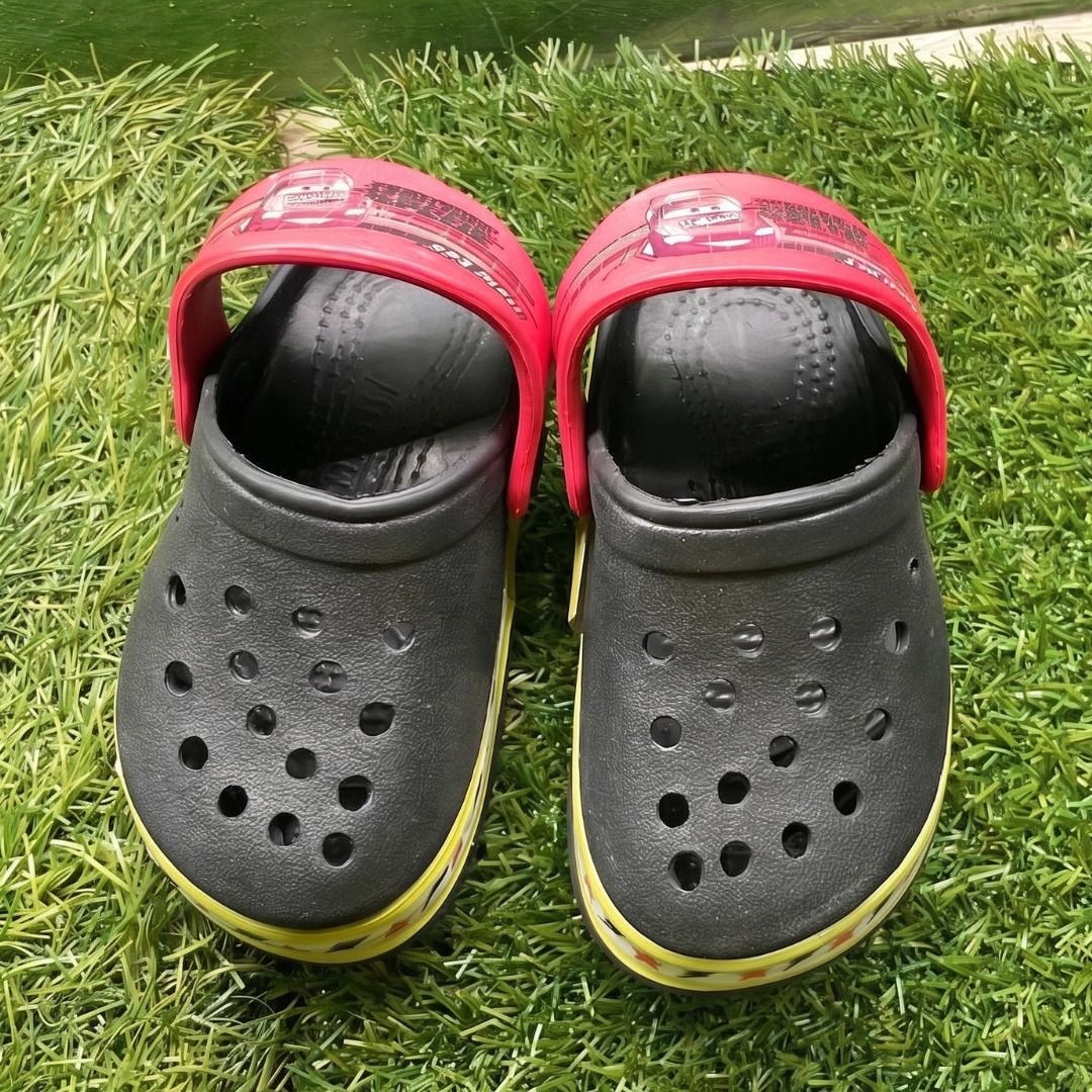 Kids' Crocs Lightning McQueen Clogs Size 16 (Category: Babies & Kids Fashion) located in Quezon City. Submitted by eilgaraje (Listing ID 1453401325, Image 1). Description: - Black Crocs with iconic red Lightning McQueen straps. - Features a fun yellow trim around the sole. - Designed for little fans of the Cars movie. - Easy slip-on, slip-off style for kids. - Ideal for playtime, beach trips, or casual outings. - Made in China. as posted used in 