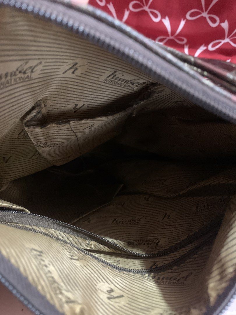KIMBEL INTERNATIONAL Embossed Shoulder Bag (Category: Shoulder Bags) located in Manila. Submitted by elaitems (Listing ID 1453329159, Image 2). Description: - Cool embossed shoulder bag from KIMBEL INTERNATIONAL - Unique pattern all over - Zipper closure - Interior pockets - Adjustable strap - Great for everyday use.