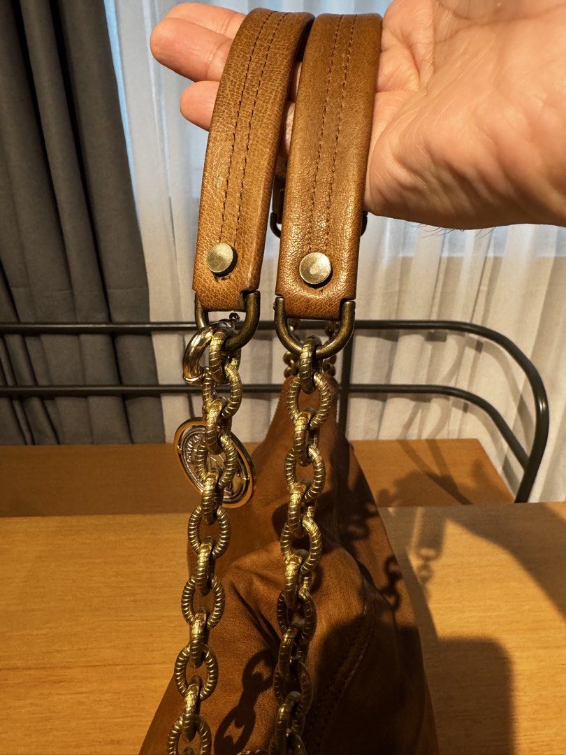 Lanvin Paris Brown Leather Chain Convertible Shoulder Bag (Category: Luxury Bags & Wallets) located in Mandaluyong City. Submitted by j4yw3e (Listing ID 1453329685, Image 3). Description: - Authentic Lanvin Paris brown leather convertible chain shoulder bag - brass gold hardware with a tortoise shell turn lock closure; includes a coin charm with the logo - minimal signs of use on the body but nothing too obvious. Stitches intact, overall in good 