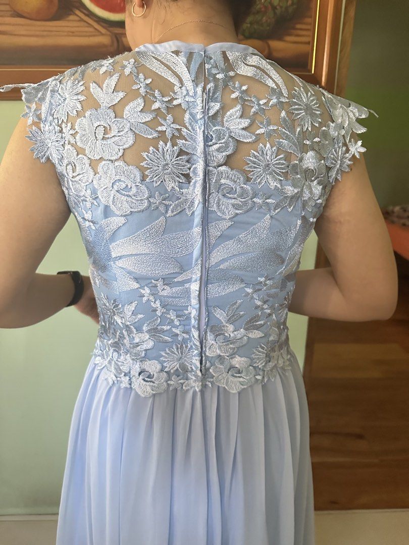 Light Blue Lace Overlay Maxi Dress (Category: Dresses) located in Santa Rosa. Submitted by jstna (Listing ID 1453270237, Image 3). Description: - Stunning light blue maxi dress - Intricate lace detailing on the bodice - Elegant cap sleeves - Flowy chiffon skirt for a graceful silhouette - Convenient back zipper closure - Ideal for formal events, parties, or special occasions - Price negotiable.