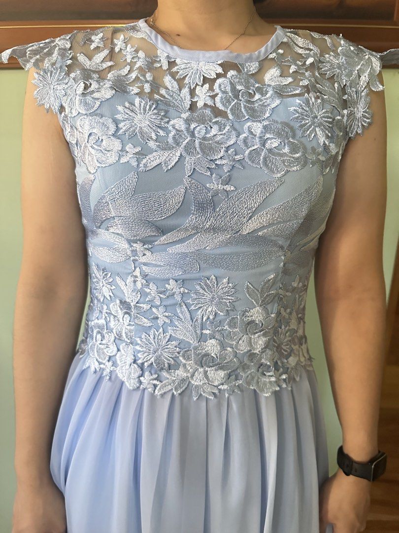 Light Blue Lace Overlay Maxi Dress (Category: Dresses) located in Santa Rosa. Submitted by jstna (Listing ID 1453270237, Image 2). Description: - Stunning light blue maxi dress - Intricate lace detailing on the bodice - Elegant cap sleeves - Flowy chiffon skirt for a graceful silhouette - Convenient back zipper closure - Ideal for formal events, parties, or special occasions - Price negotiable.