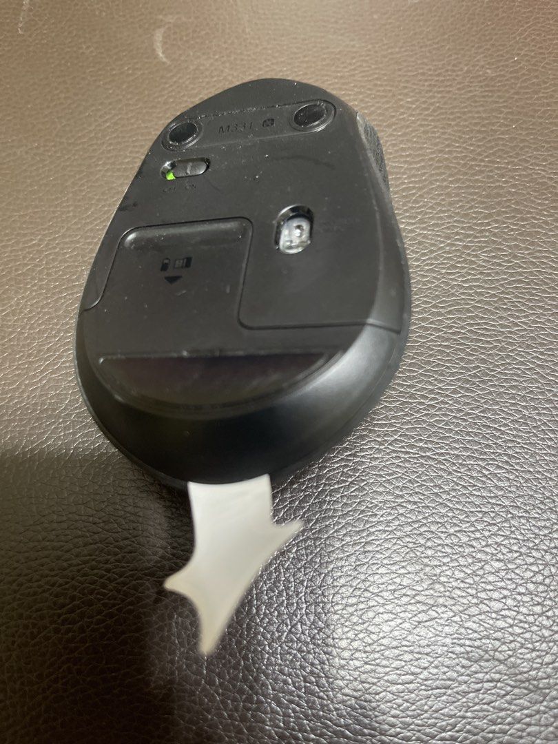 Logitech Wireless Mouse (Category: Mouse & Mousepads) located in Singapore. Submitted by ace.media.free (Listing ID 1453353308, Image 2). Description: - Black Logitech Wireless Mouse - Excellent working condition - Features scroll wheel and two buttons - On/Off switch and battery compartment located at the bottom - Ready for a new owner!.