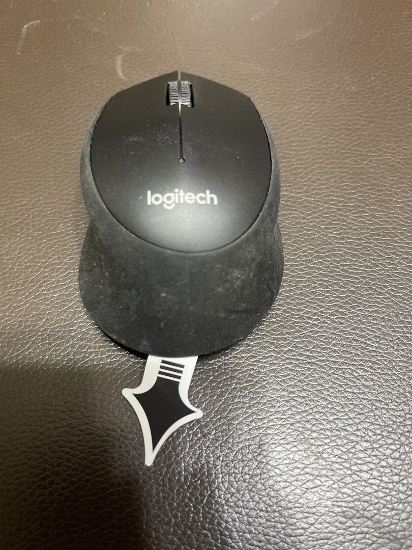 Logitech Wireless Mouse (Category: Mouse & Mousepads) located in Singapore. Submitted by ace.media.free (Listing ID 1453353308, Image 1). Description: - Black Logitech Wireless Mouse - Excellent working condition - Features scroll wheel and two buttons - On/Off switch and battery compartment located at the bottom - Ready for a new owner!.