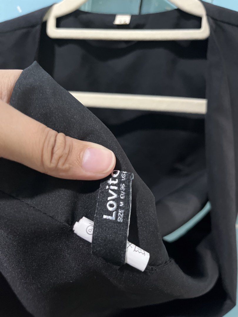 Lovito Black Lace-Up Vest (Category: Sleeveless) located in San Juan City. Submitted by superash (Listing ID 1453329814, Image 2). Description: - Lovito black vest - Lace-up front detail - Estimated size M - Ideal for layering over tops or dresses - Simple and chic style.