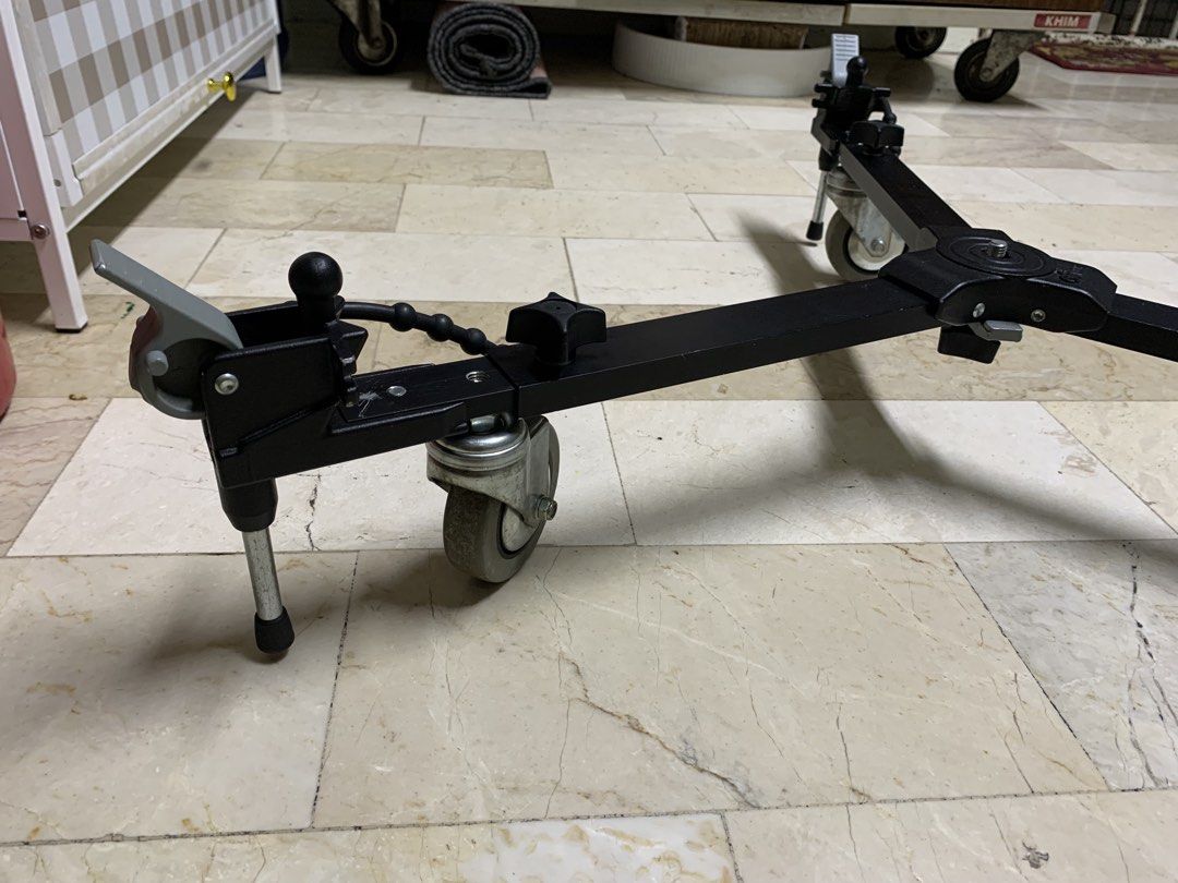 Manfrotto 127VS Dolly Variable Leg Spread Portable Dolly (Black) (Category: Tripods & Monopods) located in Paranaque City. Submitted by seb_trading (Listing ID 1453381445, Image 3). Description: Manfrotto 127VS Variable Leg Spread Portable Dolly (Black) Manfrotto 127 Tripod Dolly The Manfrotto 127VS is the variable leg portable dolly. This dolly has a special feature that allows adjustment of the radius from a maximum of 44.9" to as little as 30.