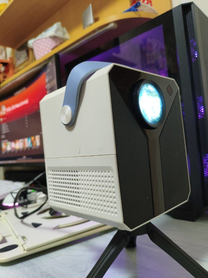 Mini Android Projector (Category: Projectors) located in Singapore. Submitted by chestyechy (Listing ID 1453364864, Image 1). Description: Power adapter not included, can't seem to change to HDMI output for some reasons **** MEETUP ONLY AT MY BLOCK THERE FOR MY CONVENIENCE **** Delivery fee - $2 Negotiable.
