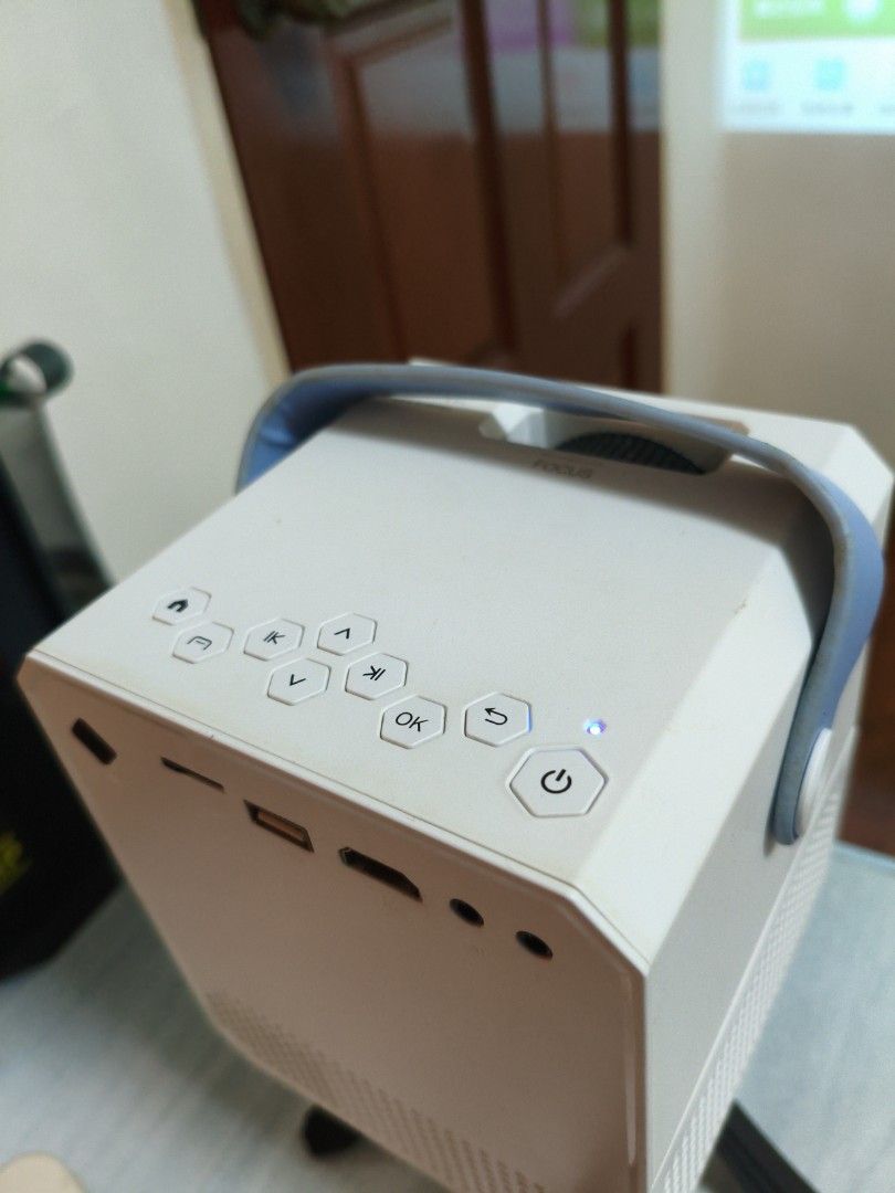 Mini Android Projector (Category: Projectors) located in Singapore. Submitted by chestyechy (Listing ID 1453364864, Image 3). Description: Power adapter not included, can't seem to change to HDMI output for some reasons **** MEETUP ONLY AT MY BLOCK THERE FOR MY CONVENIENCE **** Delivery fee - $2 Negotiable.