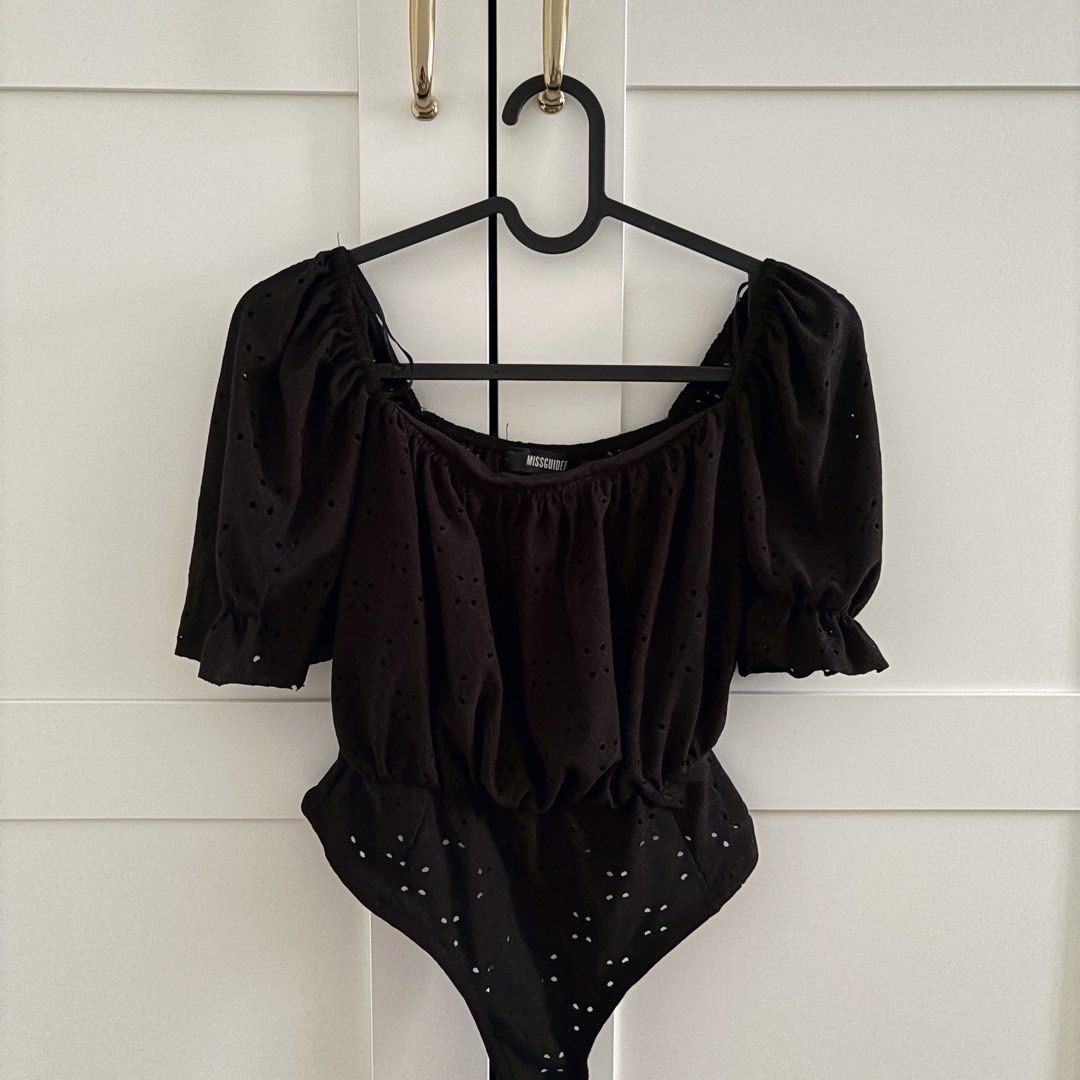 Missguided Black Eyelet Puff Sleeve Bodysuit (Category: Others Tops) located in Santa Rosa. Submitted by shopettiene (Listing ID 1453429114, Image 1). Description: Black puff sleeve bodysuit from Missguided With eyelet detailing and snap closure at the bottom for easy wear Brand new with tags unattached Retailed for 1.8k (£ 22) Bought in Missguided UK.