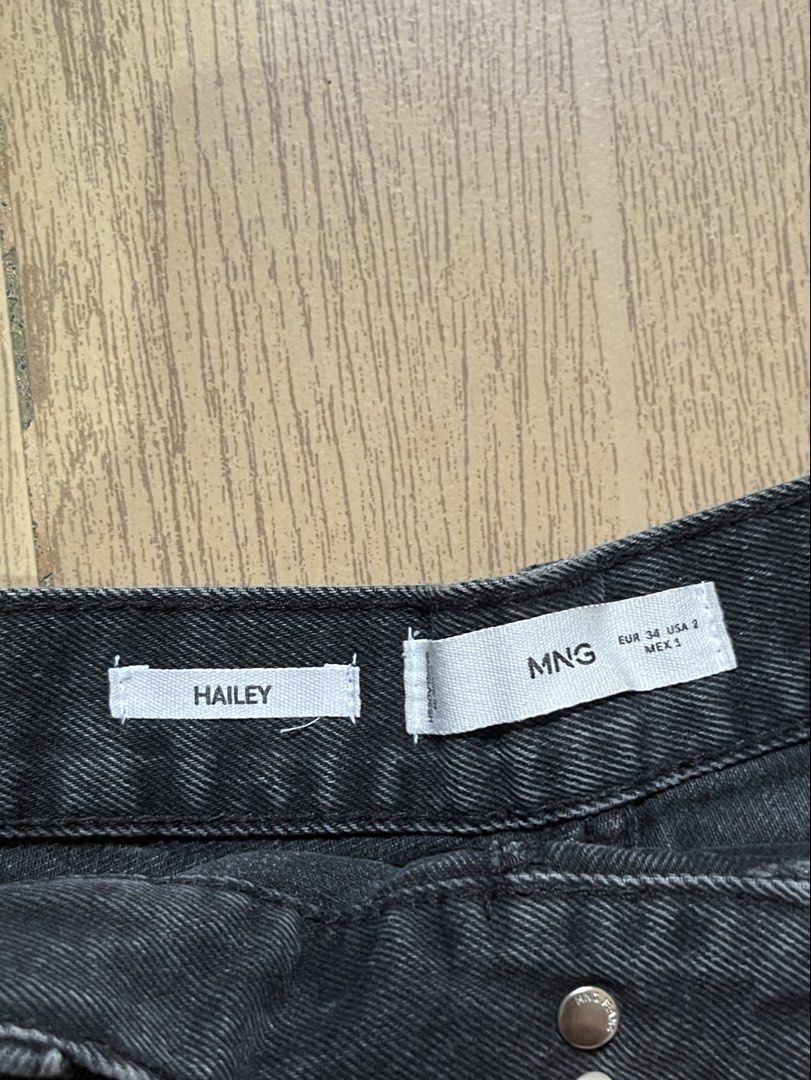 MNG Hailey Black Denim Ripped Shorts (Category: Shorts) located in Iloilo. Submitted by acysblmnth (Listing ID 1453336779, Image 2). Description: - Brand: MNG - Color: Black Denim - Model: Hailey - Closure: Button fly - Details: Distressed ripped hem, raw hem finish - Style: Casual wear.