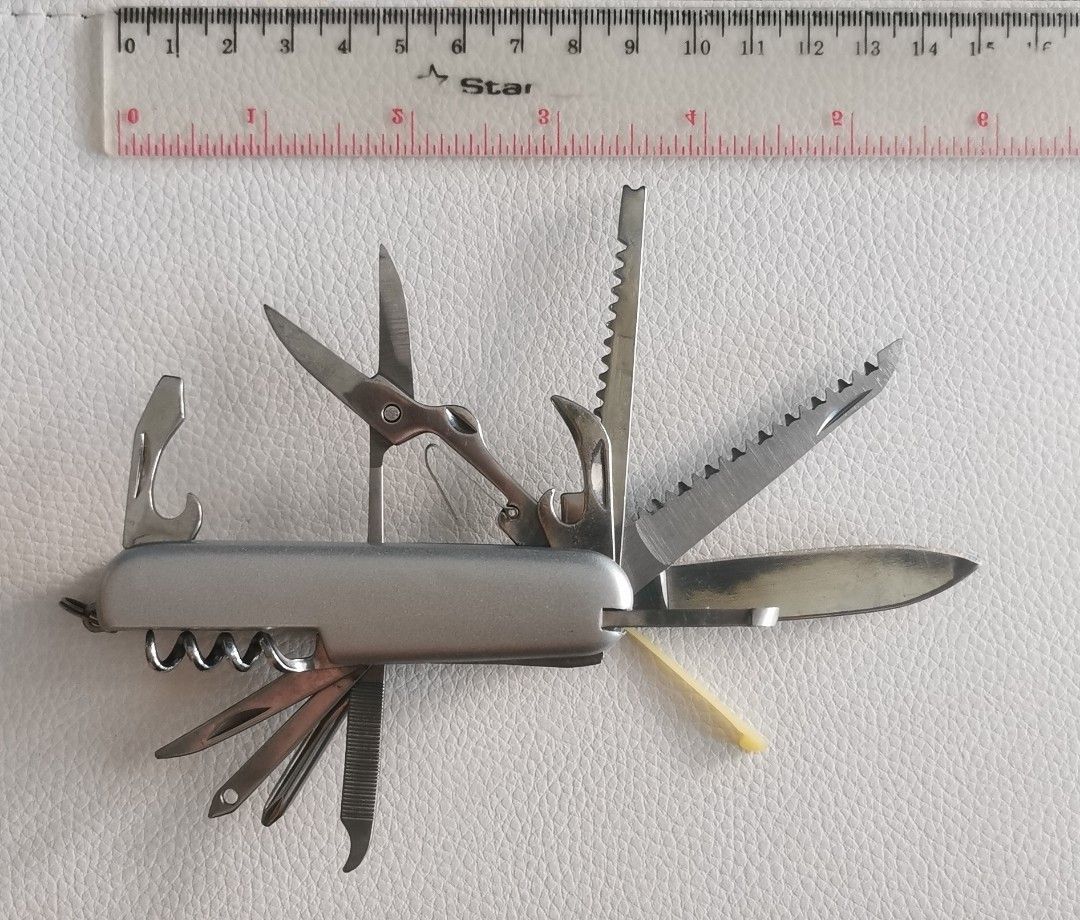 Multi tool (Category: Men's Grooming) located in Singapore. Submitted by stevendzz (Listing ID 1453272422, Image 1). Description: - Sleek silver multi-tool - Includes knife, scissors, corkscrew, bottle opener, saw, and other essential tools - Compact and portable design - Durable construction - Ideal for everyday carry, camping, and DIY tasks - In excellent, pre-loved condition.