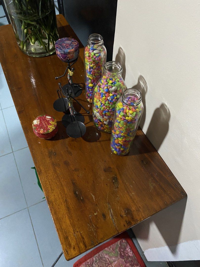 Nara Console Table (Category: Tables & Sets) located in Paranaque City. Submitted by coolaj (Listing ID 1453414126, Image 3). Description: - Solid wood construction - Beautiful carved detail on the front - Ample surface space for decor - Lower shelf for extra storage - Ideal for entryways or living rooms - Minor surface wear consistent with use.