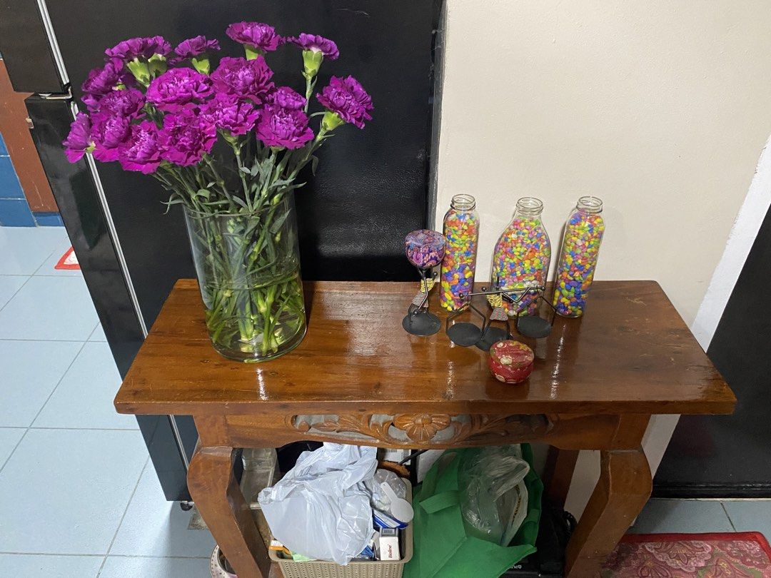 Nara Console Table (Category: Tables & Sets) located in Paranaque City. Submitted by coolaj (Listing ID 1453414126, Image 2). Description: - Solid wood construction - Beautiful carved detail on the front - Ample surface space for decor - Lower shelf for extra storage - Ideal for entryways or living rooms - Minor surface wear consistent with use.