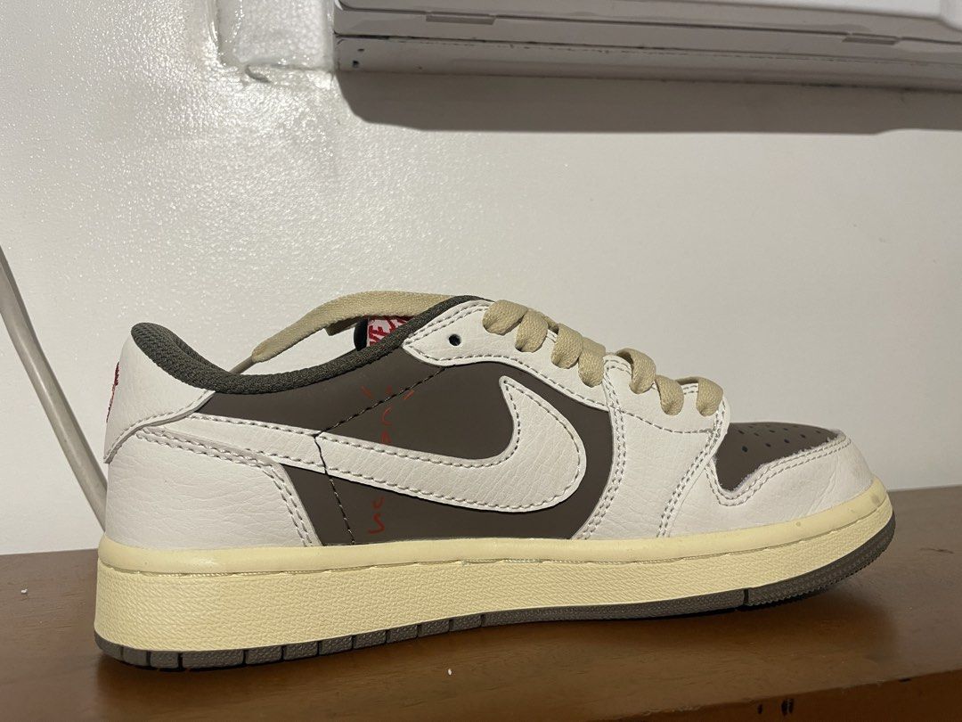 Nike Air Jordan 1 Low Travis Scott (Category: Sneakers) located in Pasig City. Submitted by sheenabelle_ (Listing ID 1453237094, Image 3). Description: - Travis Scott Jordan 1 Low - Features iconic reverse swoosh - Cactus Jack detailing - Comes with cream laces - Essential addition to any sneaker collection - Vietnam - negotiable.