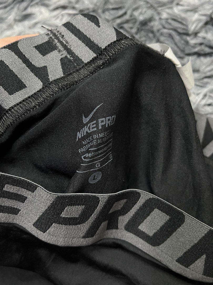 Nike Pro Compression Tights Black (Category: Activewear) located in Bulacan. Submitted by sef19 (Listing ID 1453313254, Image 2). Description: - Black Nike Pro compression tights - Knee-length design - Iconic Nike swoosh logo on the leg - Repeating 'PRO NIKE PRO' pattern on the waistband - Made in Mexico - Ideal for workouts and sports.