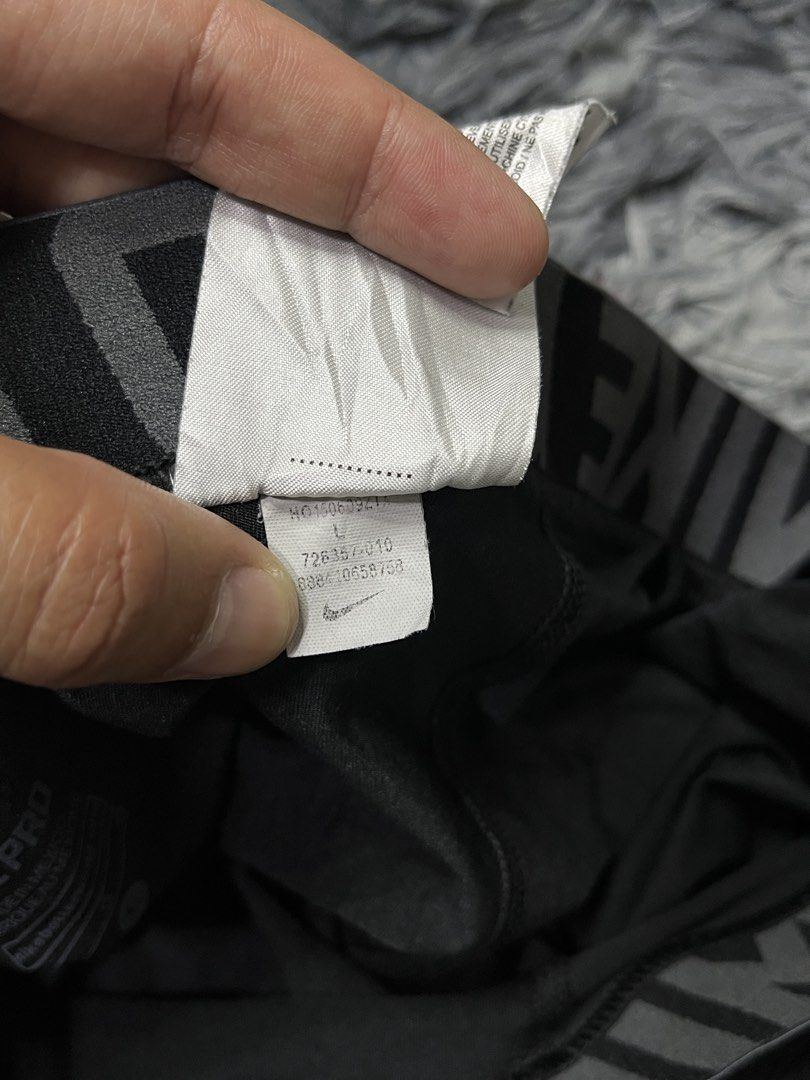 Nike Pro Compression Tights Black (Category: Activewear) located in Bulacan. Submitted by sef19 (Listing ID 1453313254, Image 3). Description: - Black Nike Pro compression tights - Knee-length design - Iconic Nike swoosh logo on the leg - Repeating 'PRO NIKE PRO' pattern on the waistband - Made in Mexico - Ideal for workouts and sports.