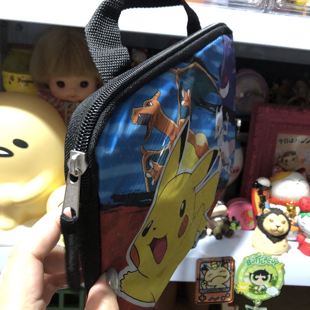 NINTENDO POKEMON PIKACHU PADDED TABLET CASE BAG (Category: Cases & Sleeves) located in Quezon City. Submitted by kitsune.treasures (Listing ID 1453254141, Image 3). Description: *First to pay policy! *1 day reservation only. Failure to pay on time, auto cancel. 📍Quezon City * MOD: J&T | Lalamove * MOP: GCASH | BPI 📦ON HAND AND READY TO SHIP! CONDITION: WHAT YOU SEE IS WHAT YOU GET. Dimensions: Kindly check the photos for the actual measurements
