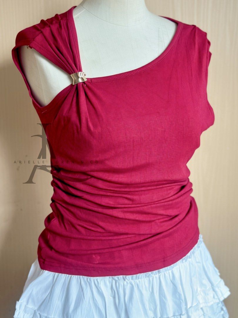 One-Shoulder Asymmetrical Top with Gold Ring Detail (Category: Blouses) located in Manila. Submitted by ariellelorenco (Listing ID 1453381017, Image 3). Description: - Trendy red one-shoulder top - Features a chic gold ring detail on the strap - Comfortable ribbed fabric - Flattering side ruching - Short sleeves for a relaxed fit - Perfect for dressing up or down -Free size up to XL -Very stretchy fabric -Bust up to 40in max -With side ruched to 