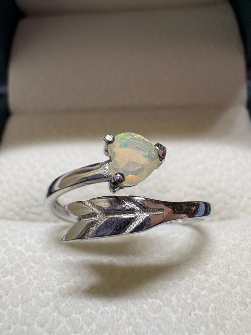 Opal Ring (Category: Rings) located in Singapore. Submitted by Discoverme (Listing ID 1453340501, Image 2). Description: ✨ Natural Opal Ring – S925 Sterling Silver Elegant S925 sterling silver ring featuring a genuine natural opal with beautiful flashes of green play-of-colour. The graceful leaf-inspired setting creates a timeless and feminine design, perfect for everyday wear or special occasions..