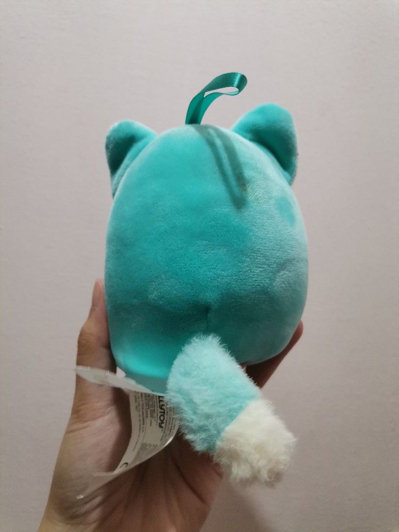 Original Squishmallows Teal Fox Plush Toy (Category: Plushies & Soft Toys) located in Makati City. Submitted by kookybearsstuff (Listing ID 1453333446, Image 2). Description: - Original Squishmallow teal fox plush - Super soft and squishy material - Features sparkly ears and a fluffy belly - Ideal for Squishmallow collectors or as a cuddle buddy - Makes a great gift for fans.