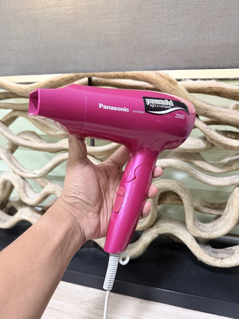 Panasonic Hot Pink Hair Dryer (Category: Hair) located in Pasig City. Submitted by iambernabe (Listing ID 1453344482, Image 1). Description: - Pink Panasonic EH-ND62 Hair Dryer - Powerful, light, and compact design - 3 heat and speed settings - Cool shot button for styling - Ideal for everyday use - In excellent working condition.
