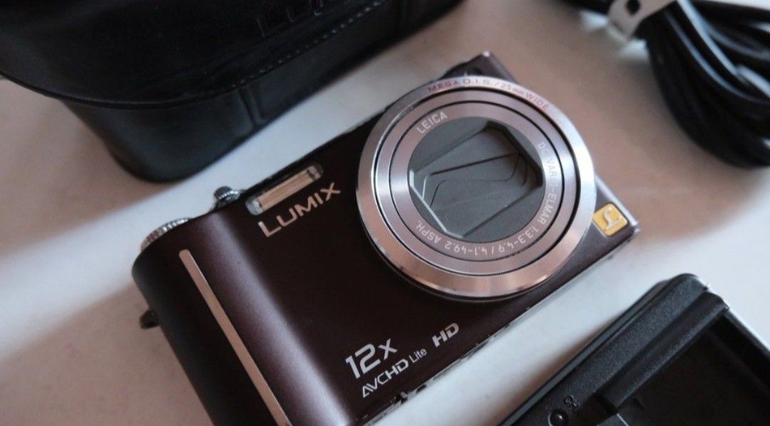 PANASONIC LUMIX DMC TZ7 (Category: Cameras) located in Quezon City. Submitted by justdump_a (Listing ID 1453235719, Image 2). Description: selling my very pre-loved digicam 🥹 NO TO BOGUS BUYER!!! PANASONIC LUMIX DMC TZ7 can provide moree just message! PHP 5700 (same price that I bought din sa past owner) rfs: don't use it anymore, recently bought this May this year in carousel. Pics from the past owner. But I can do send recent photos :) ✦10.1 m