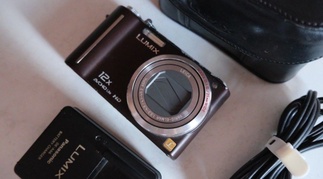 PANASONIC LUMIX DMC TZ7 (Category: Cameras) located in Quezon City. Submitted by justdump_a (Listing ID 1453235719, Image 3). Description: selling my very pre-loved digicam 🥹 NO TO BOGUS BUYER!!! PANASONIC LUMIX DMC TZ7 can provide moree just message! PHP 5700 (same price that I bought din sa past owner) rfs: don't use it anymore, recently bought this May this year in carousel. Pics from the past owner. But I can do send recent photos :) ✦10.1 m