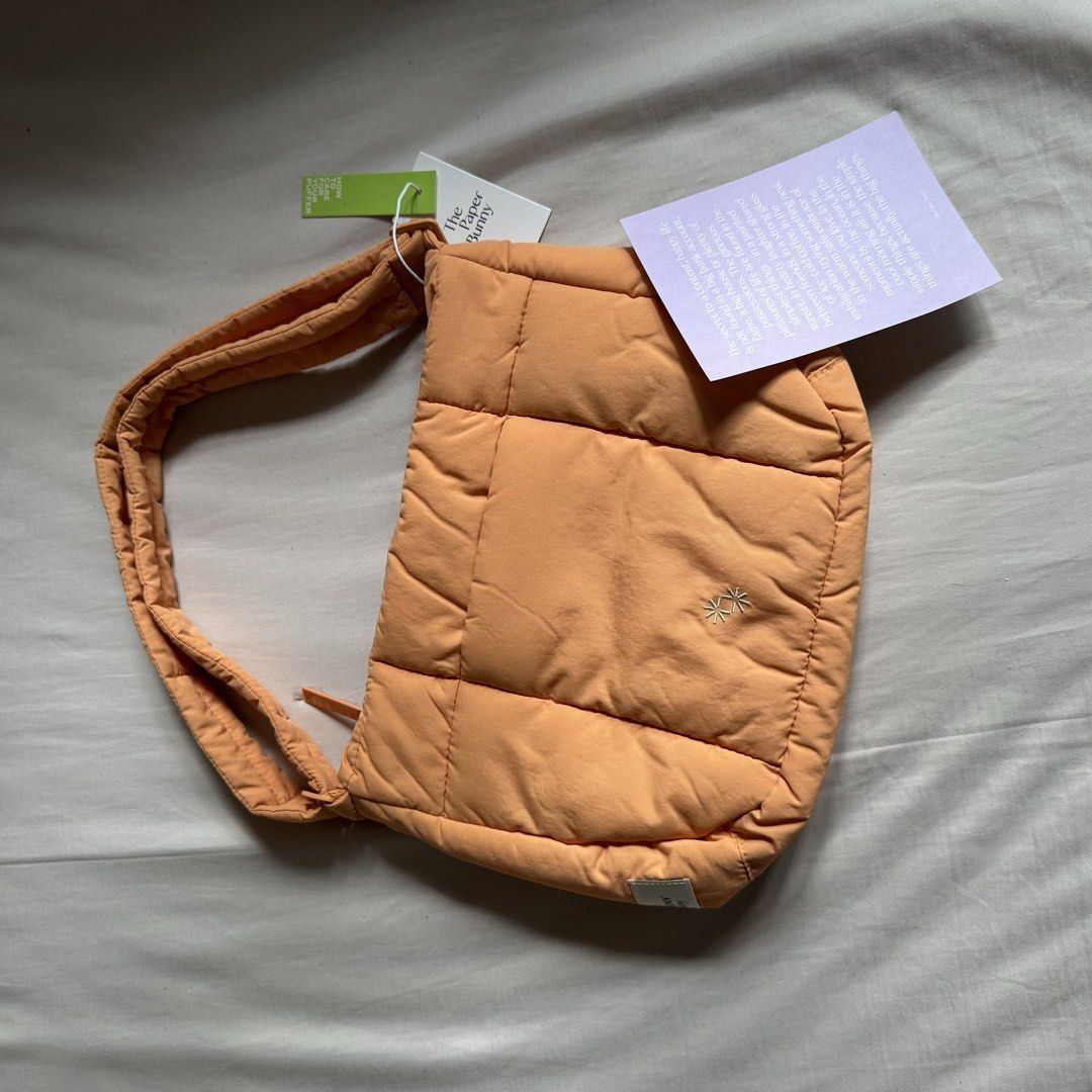 Paper Bunny Shoulder Bag - Orange (Category: Shoulder Bags) located in Davao. Submitted by piscestingz (Listing ID 1453409837, Image 2). Description: - Orange padded shoulder bag - Stylish quilted design - Small embroidered detail on the front - Adjustable strap for comfort - Ideal for everyday use rfs: decluttering.