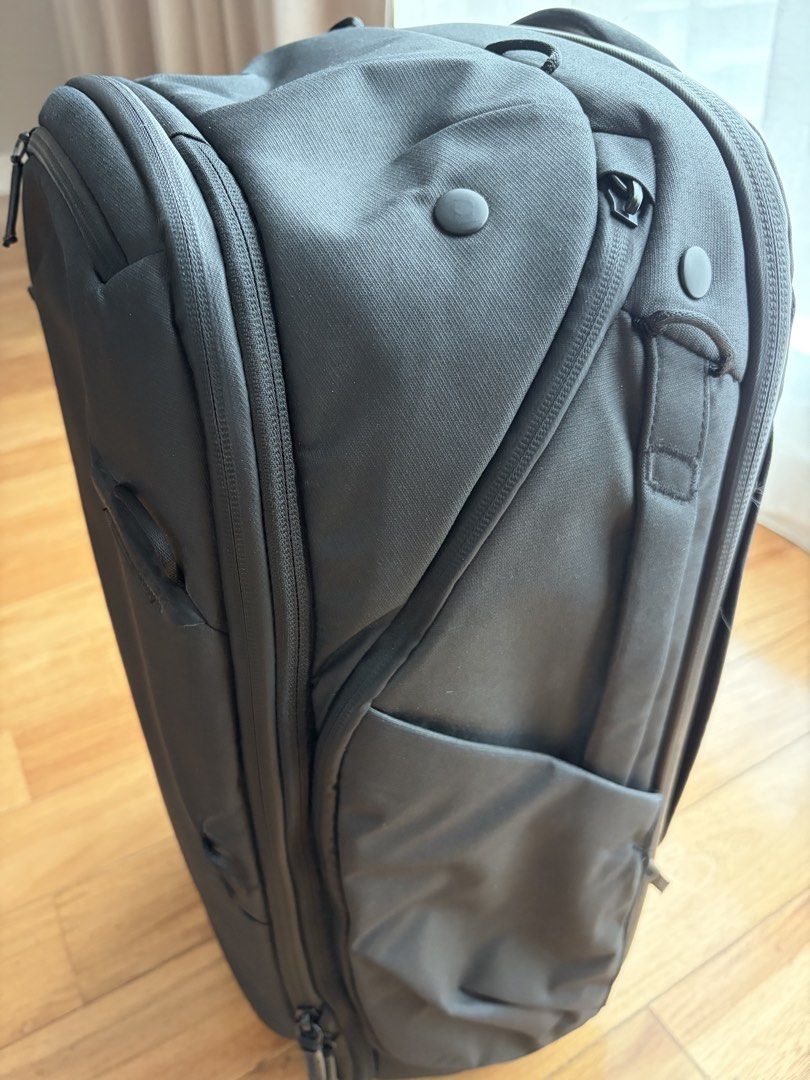 Peak Design Travel Backpack 45L in Black (Category: Backpacks) located in Manila. Submitted by clearspaceshop (Listing ID 1453266557, Image 2). Description: Elevate your travel setup with this meticulously maintained Peak Design 45L Travel Backpack that deliver a refined balance of durability, versatility, and design. Peak Design Travel Backpack 45L A flagship pack known for its architectural structure and exceptional accessibility. Expandable de