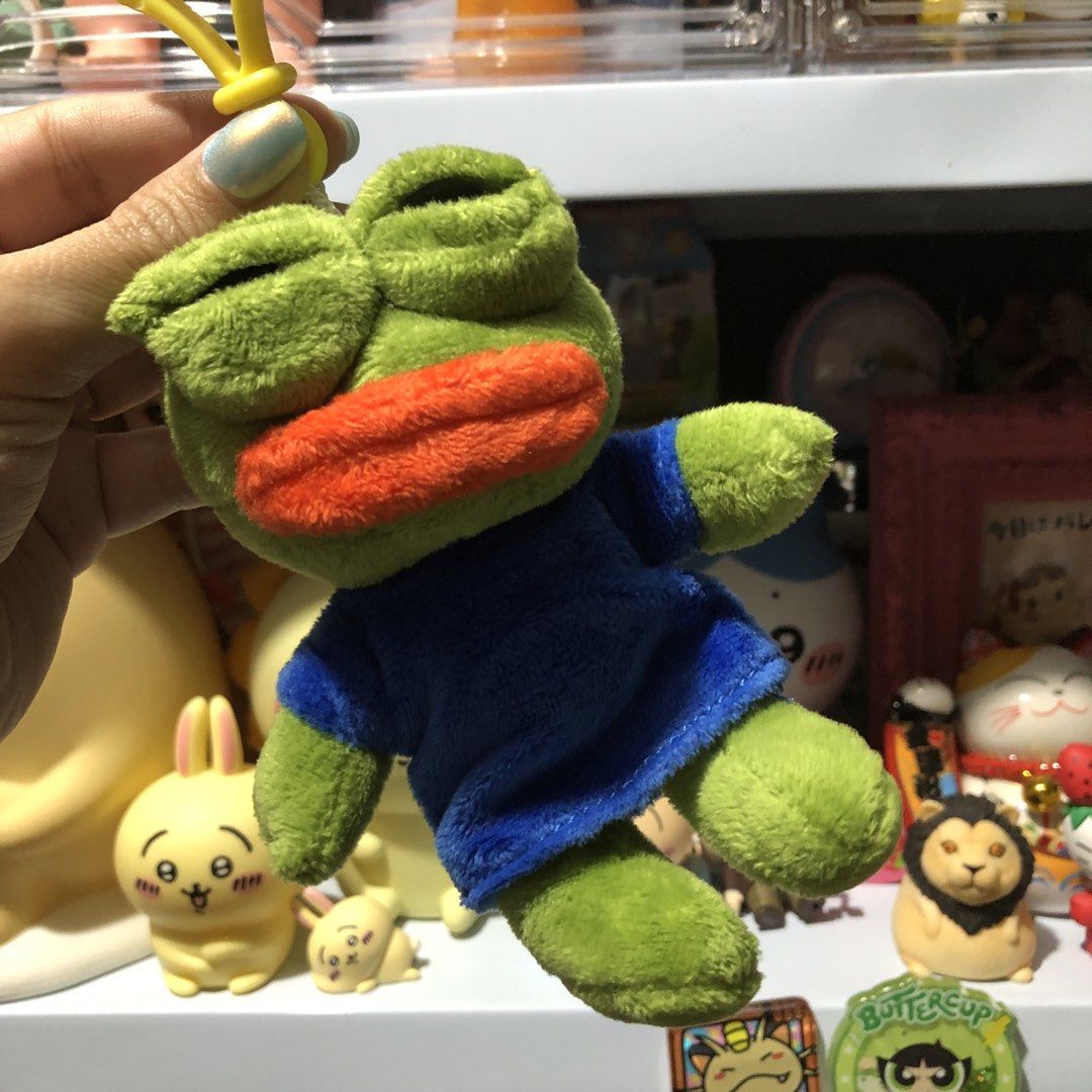 PEPE THE FROG SOFT CHARM (Category: Plushies & Soft Toys) located in Quezon City. Submitted by kitsune.treasures (Listing ID 1453254792, Image 1). Description: *First to pay policy! *1 day reservation only. Failure to pay on time, auto cancel. 📍Quezon City * MOD: J&T | Lalamove * MOP: GCASH | BPI 📦ON HAND AND READY TO SHIP! CONDITION: WHAT YOU SEE IS WHAT YOU GET. Dimensions: Kindly check the photos for the actual measurements. Please check all
