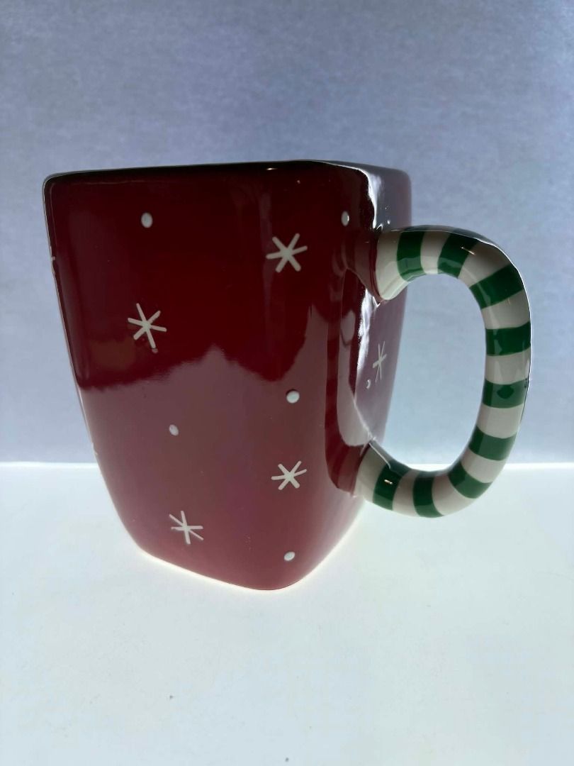 Personal Creations Embossed Snowman Mug (Category: Coffee & Tea Tableware) located in Caloocan City. Submitted by rabbithole2026 (Listing ID 1453391272, Image 3). Description: Festive and eye-catching large ceramic mug featuring an embossed 3D snowman face with raised details, rosy cheeks, carrot nose, black top hat, and holly accents. The oversized square shape and striped green-and-white handle make it perfect for coffee, tea, hot chocolate, so