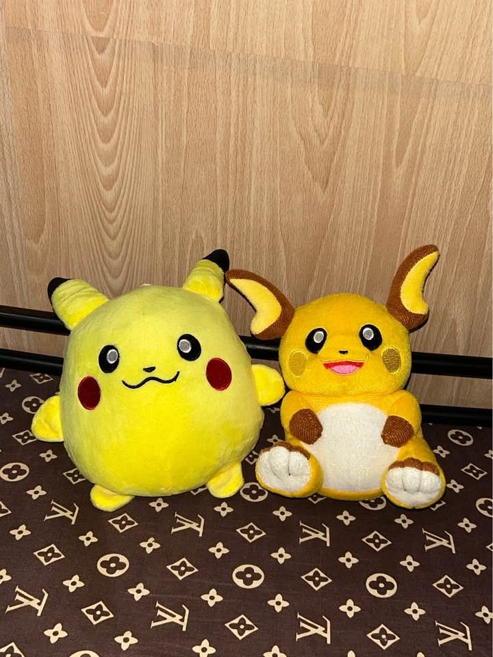 Pikachu and Raichu Plush Toys (Category: Plushies & Soft Toys) located in Paranaque City. Submitted by strawberrified (Listing ID 1453391239, Image 1). Description: Pokémon (2 pcs) - Pikachu (1 pc) - Raichu (1 pc) ₱80 each ₱150 for both - Adorable Pikachu and Raichu plush toy set. - Super soft and cuddly material. - Ideal for any Pokemon fan. - Perfect for decorating your space or for playtime. - Don't miss out on this cute duo! 📍 tambo, parañaq