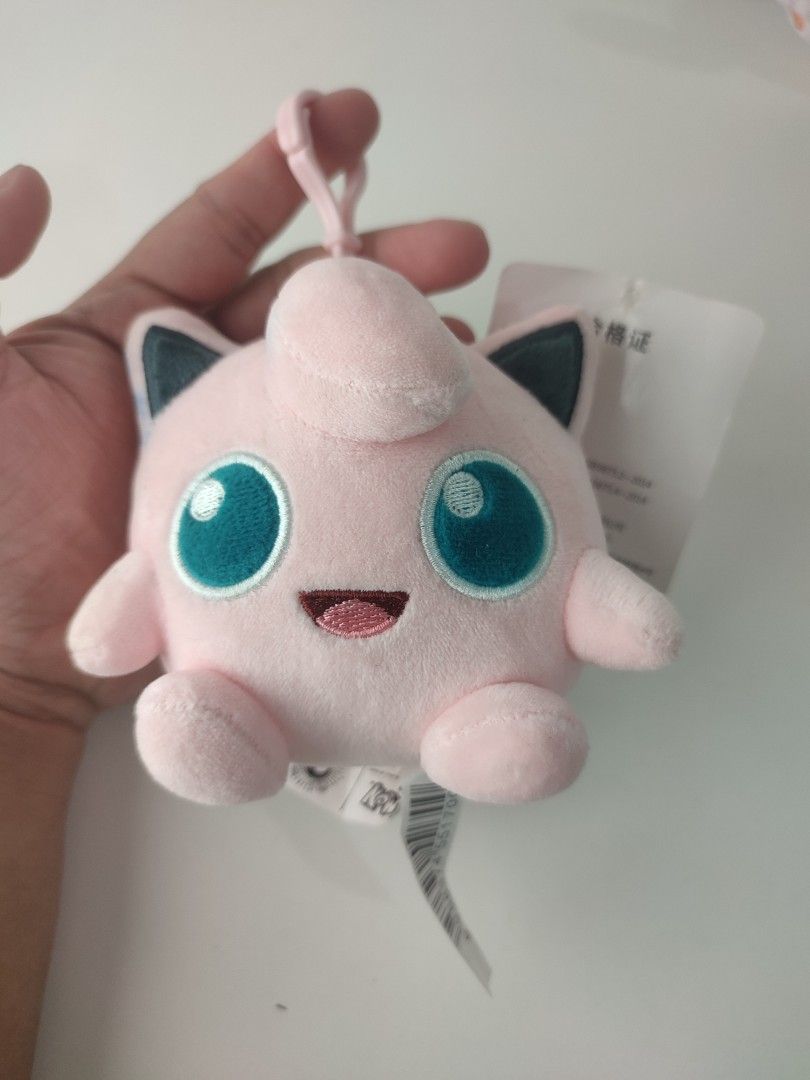 Pokemon Jigglypuff Plush Keychain Toy (Category: Plushies & Soft Toys) located in Manila. Submitted by epicmountain-f20453 (Listing ID 1453278464, Image 1). Description: - Adorable Jigglypuff plush toy - Features a convenient keychain attachment - Super soft and cuddly material - Comes with original tags attached - Perfect for decorating bags, backpacks, or as a collectible - Another Mew plush is also available separately.