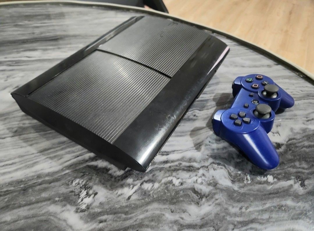 PS3 Superslim 250GB Black Console with Blue Controller (Category: PlayStation) located in Mandaluyong City. Submitted by chan.ningtatum (Listing ID 1453261758, Image 2). Description: For Sale! - PlayStation 3 250GB Black Console - Includes one blue controller - Complete Cables included - Tested and confirmed working - Great for gaming on a budget! Good Working Condition. Tested Working Checkouts via Shope e and Laz ada Available Shipping: Lalamov