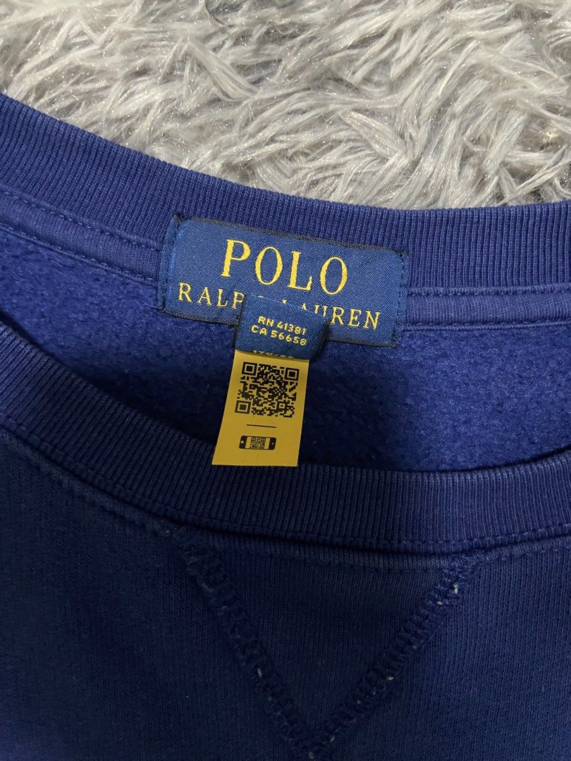Ralph Lauren Polo Bear Navy Blue Sweatshirt (Category: Activewear) located in Tuguegarao City. Submitted by nero_28 (Listing ID 1453426435, Image 3). Description: - Classic navy blue sweatshirt from Ralph Lauren. - Features the iconic Polo Bear logo embroidered in yellow on the chest. - Made from a comfortable cotton blend. - Great for casual wear. - Tagged size XL..