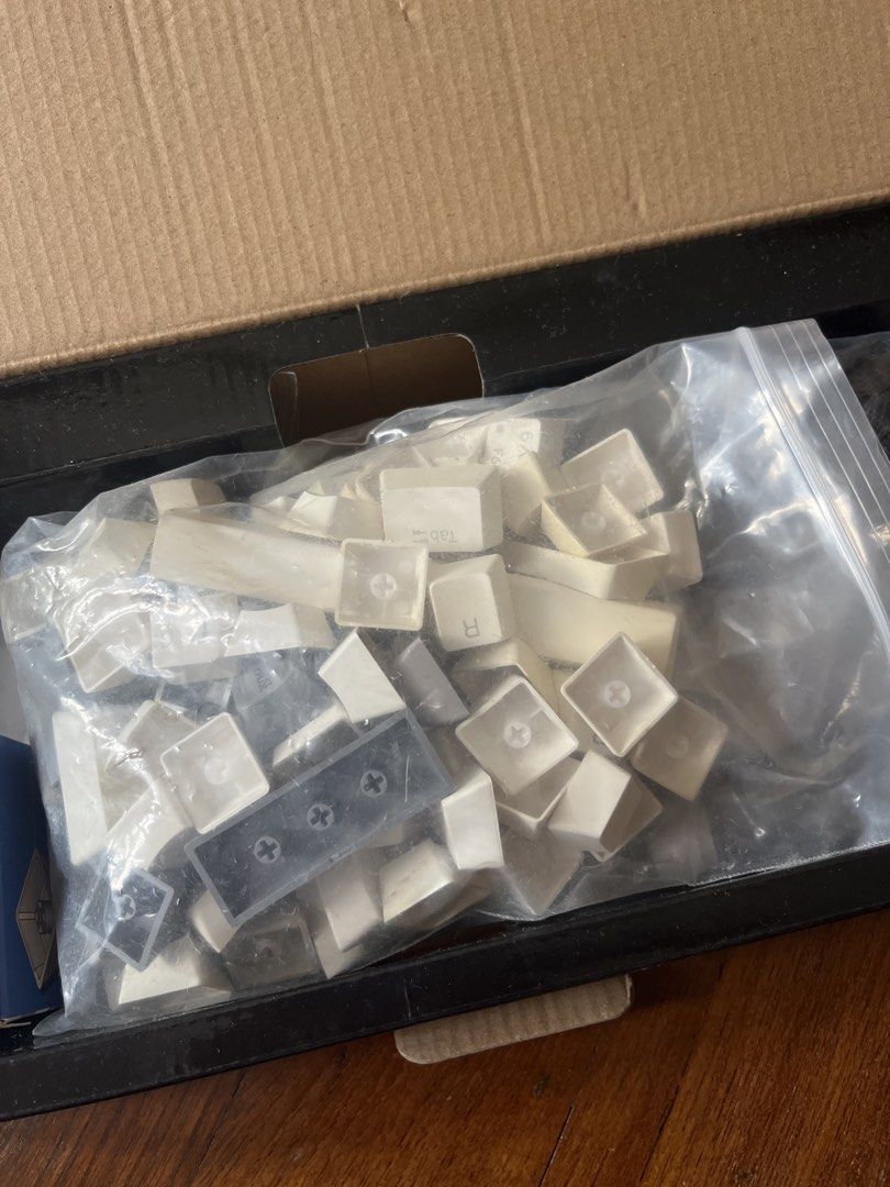 Random Keycaps (Category: Computer Keyboard) located in Singapore. Submitted by buttterbread (Listing ID 1453260478, Image 1). Description: Some have yellowed Take the whole bag for $5 Selling cheap to clear.
